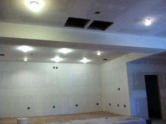 The new air return will go in the black holes. The sheetrock was installed by Tommy Barnette.